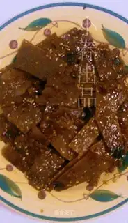 Pork jerky with black pepper and honey sauce