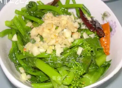Stir rapeseed heart in a stir-fried manner
