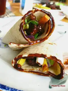 taco with shredded pork and sauce