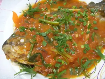 Grilled pomfret in tomato sauce