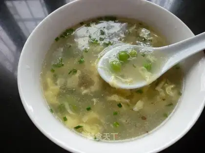 Fresh pea and egg soup