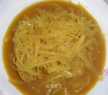 Curry shredded potatoes