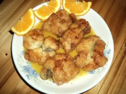 Fish nuggets in orange juice