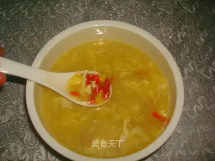 Corn soup with wolfberry chicken sauce