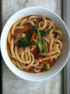 Udon noodles in tomato and oyster sauce
