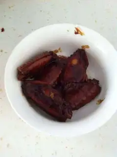 Three cups of chicken wings