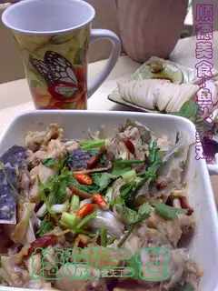 Steamed chicken with fish head