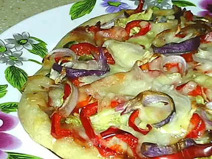 bacon and vegetables pizza