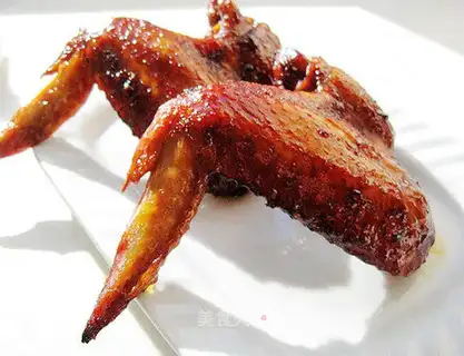 Roasted chicken wings in sauce