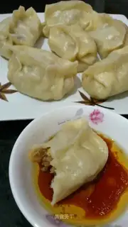 Steamed dumplings with pickled cabbage and pork