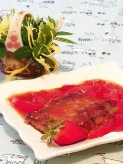 Pork chops in tomato sauce