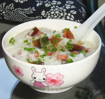 Preserved egg and sausage porridge