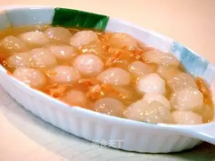 Scallop in soup and winter melon balls