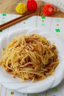 stir-fried shredded pork with blue rice