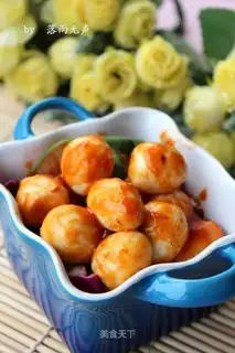 Quail eggs in tomato sauce