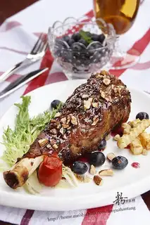 Roasted Australian leg of lamb in blueberry sauce