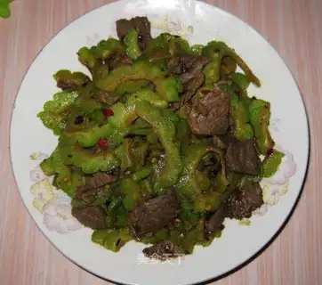 Stir fried beef with bitter gourd and bean drum