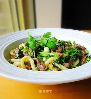 stir-fried udon with beef and cilantro