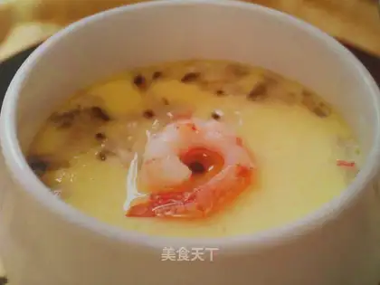 Steamed shrimp and crab meat in a tea bowl