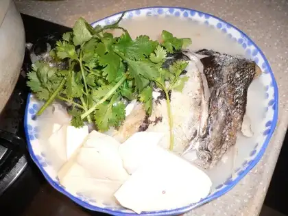 Fried fish head tofu soup