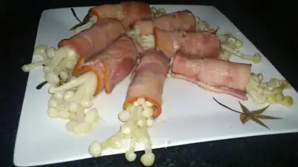 Gin and mushroom bacon rolls