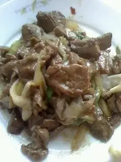 Fried pork with green onion
