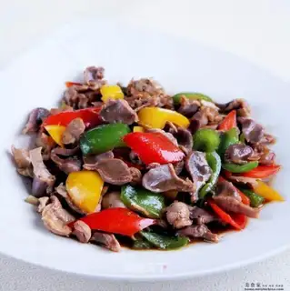 Fried chicken gizzards with colorful pepper