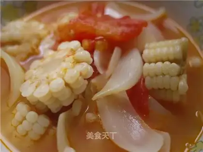 Onion, tomato and corn soup