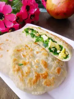 An egg box with a pickle