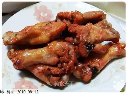 Roasted chicken wings in barbecued pork sauce