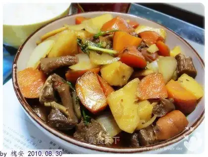 Stewed beef brisket with potatoes and carrots