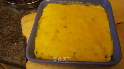 Baked potatoes with ham and cheese