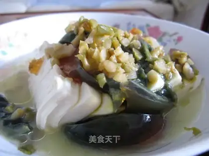 Tender tofu mixed with preserved egg
