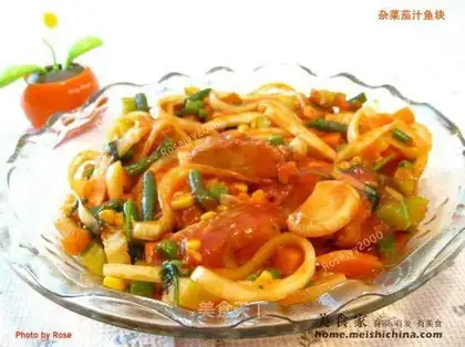 Fish pieces with mixed vegetables and grains