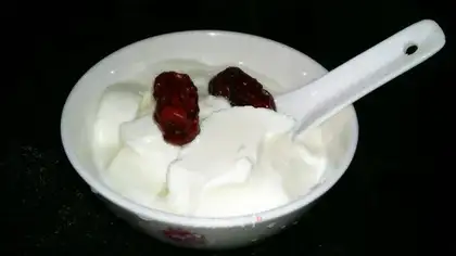 Old yogurt with red dates