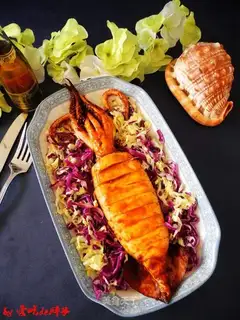 Roasted squid with olive salad
