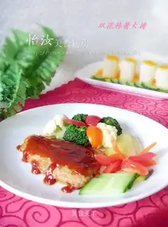 Two flowers and a large steak