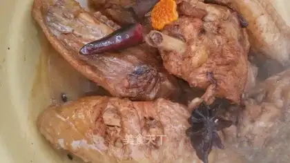 A single red chicken wing