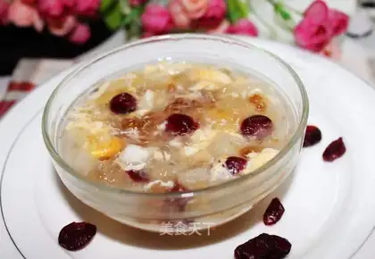 Cranberry berries and silver spoons