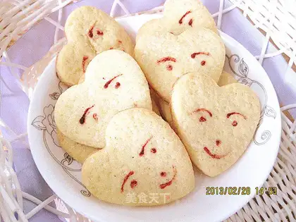Heart-shaped doll-head cookies