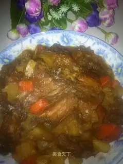 A steak stew of potatoes and carrots