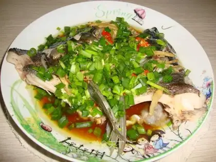 Tea and steam fish heads