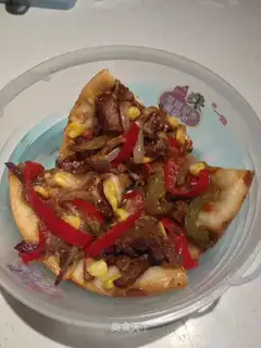 A pan and pizza