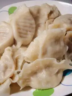 Carrots, mushrooms and pork dumplings