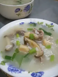 Dried scallop and duck porridge