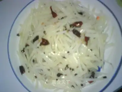 Stir shredded potatoes
