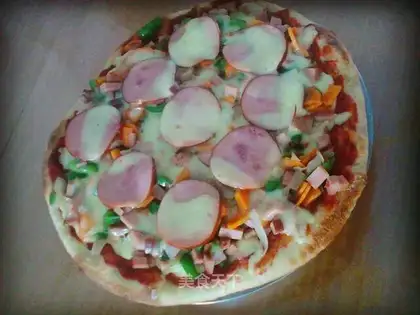 A flat pot of sausage pizza