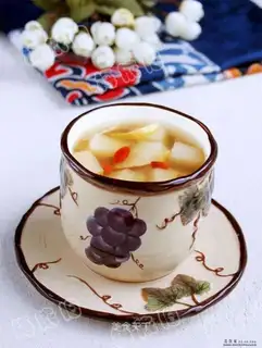 Autumn pear and tangerine peel soup