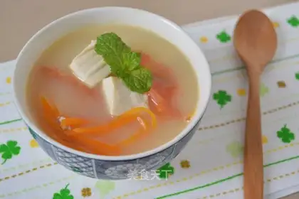 Tomato carrot fish soup