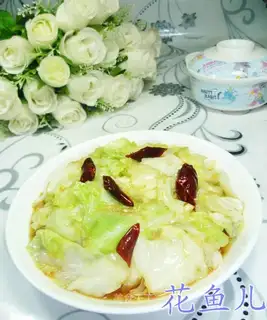 A hand tore the cabbage